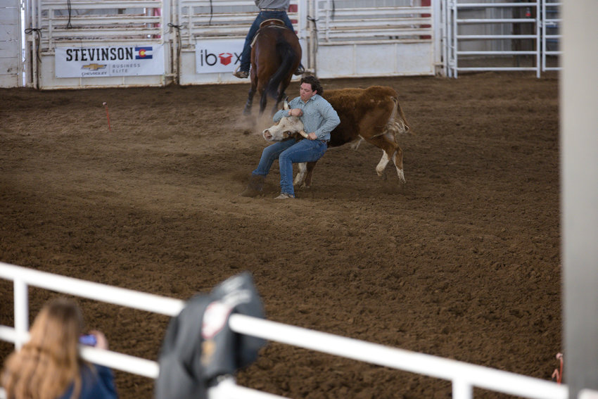 Bryce Jackson competes in steer wrestling at the March 11 Winter Rodeo at Jefferson County Fairgrounds.